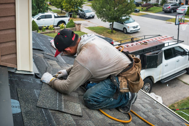 Professional Roof Replacement technician working in Ferdinand, ID